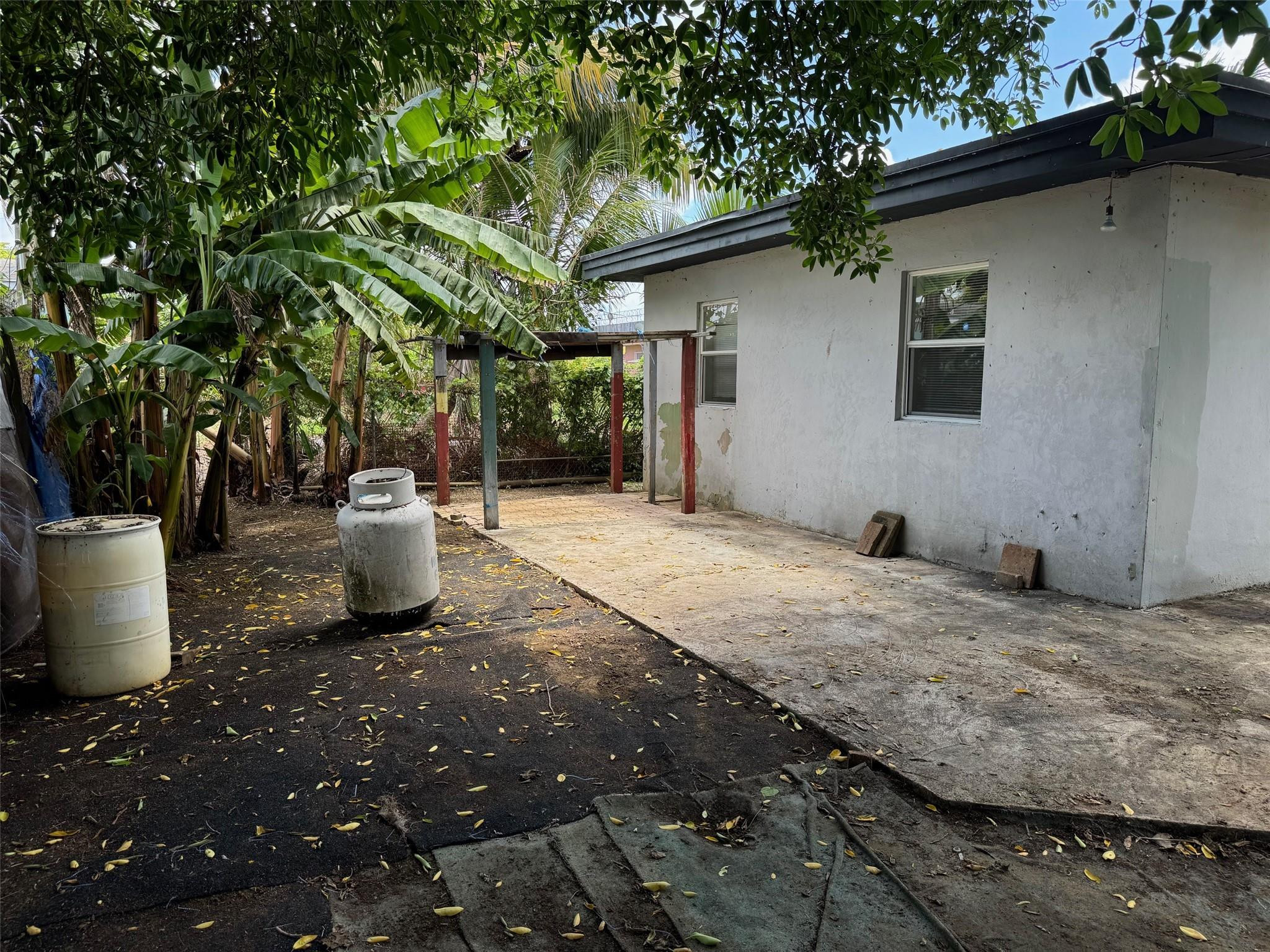 7979 Northwest 1st Place, Unit 2 Miami, FL 33150 - Photo 13 of 15 a view of a outdoor space with a patio