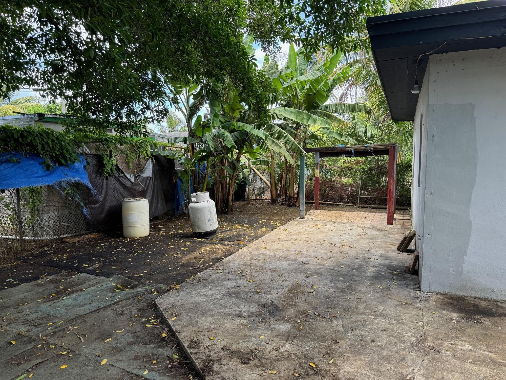 7979 Northwest 1st Place, Unit 2 Miami, FL 33150 - Photo 15 of 15 a view of a outdoor space with a patio
