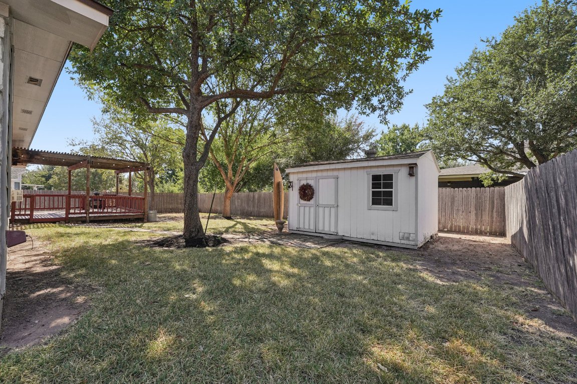 1105 Pigeon Forge Road Pflugerville, TX 78660 - Photo 14 of 19 a view of a house with a yard