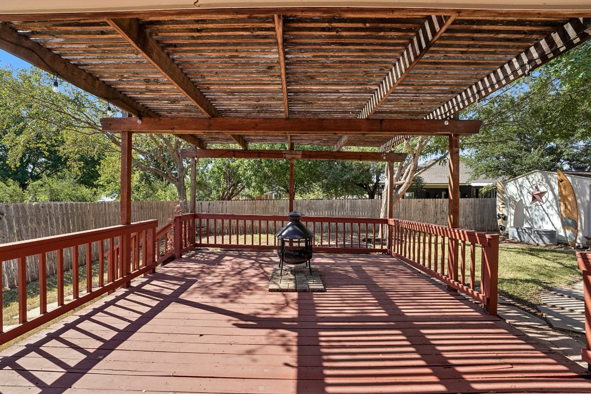 1105 Pigeon Forge Road Pflugerville, TX 78660 - Photo 15 of 19 a view of a patio with wooden floor
