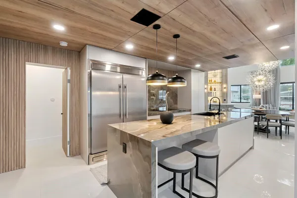 a bathroom with a bathtub and shower