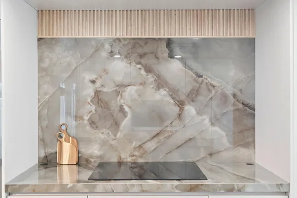 a bathroom with a double vanity sink mirror and bathtub