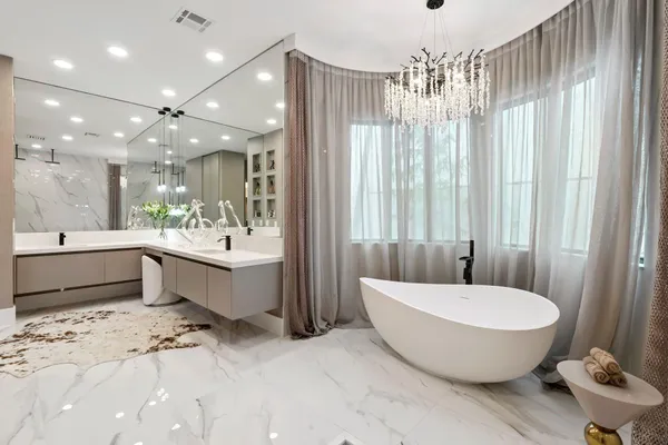 a view of a brick house with a yard