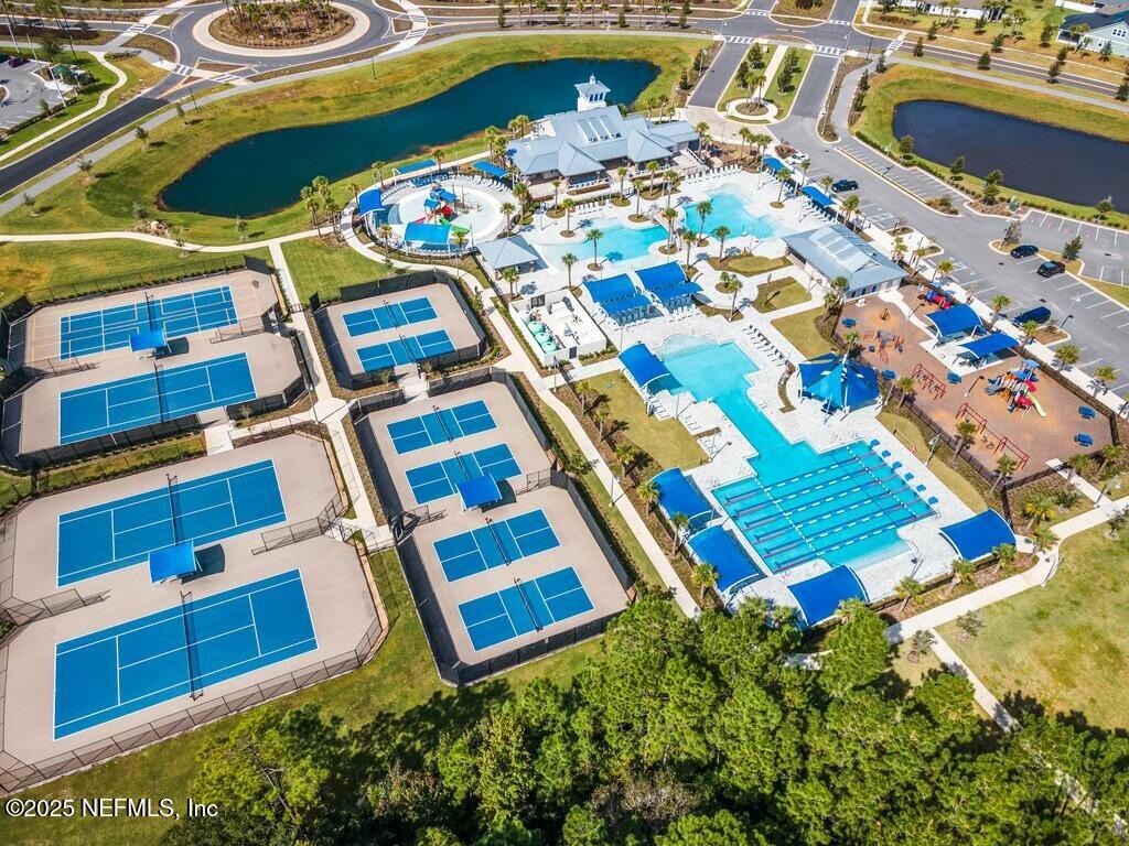 469 Archstone Way St. Augustine, FL 32092 - Photo 57 of 59 a aerial view of a balcony with chairs and umbrellas
