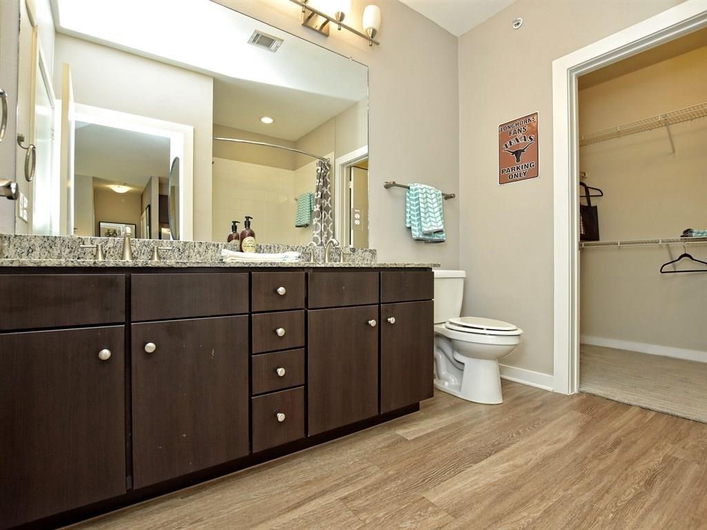 1900 Barton Springs Road, Unit 4017 Austin, TX 78704 - Photo 12 of 34 This image of the interior is representative and not of actual unit. Finishes including cabinetry, countertops, backsplash and flooring are the same. Unit 4017 is mirrored of this representative unit.