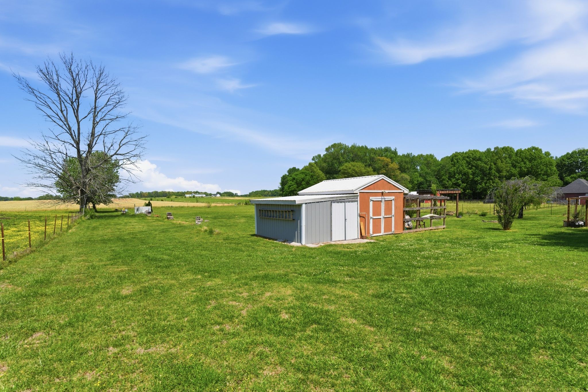 404 Logan Chapel Road Hillsboro, TN 37342 - Photo 33 of 38 a view of a house with a yard