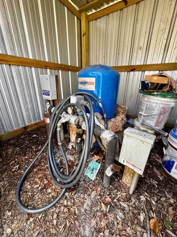 view of living room with furniture and washing machine