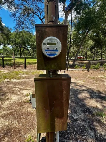 a view of a house with a big yard