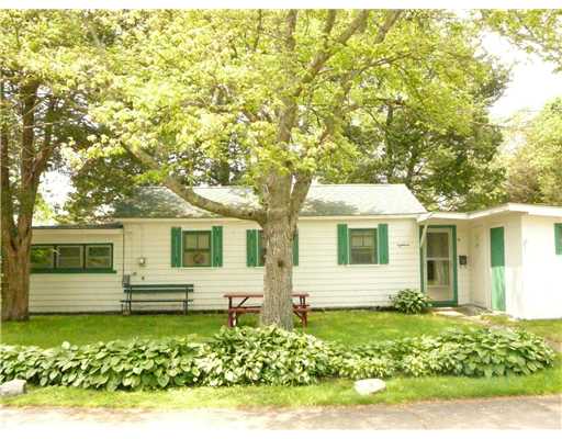 Exterior Front. Quaint old style summer cottage set in a shady corner of the Buttonwoods summer community.