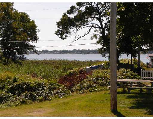 18W Budlong Farm Road Warwick, RI 02886 - Photo 12 of 12 View. A more close up look at the view this cottage has. You can almost feel the breeze coming off the bay that is only steps away from the yard!