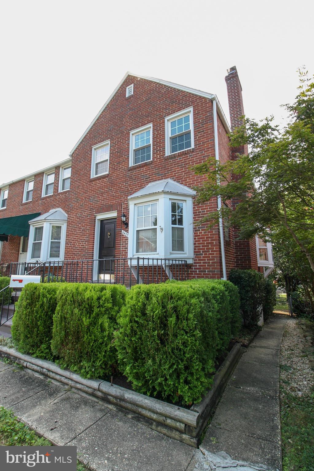 8427 Pleasant Plains Road Baltimore, MD 21286 - Photo 2 of 30 a front view of a house with a yard and plants