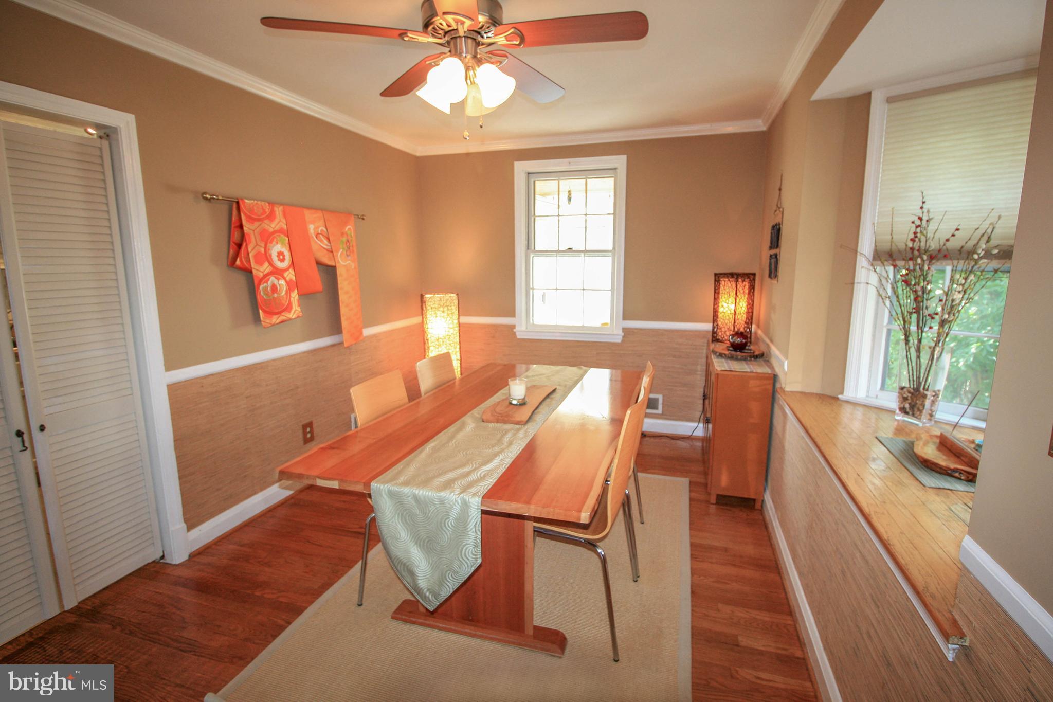 8427 Pleasant Plains Road Baltimore, MD 21286 - Photo 12 of 30 a living room with furniture and a window