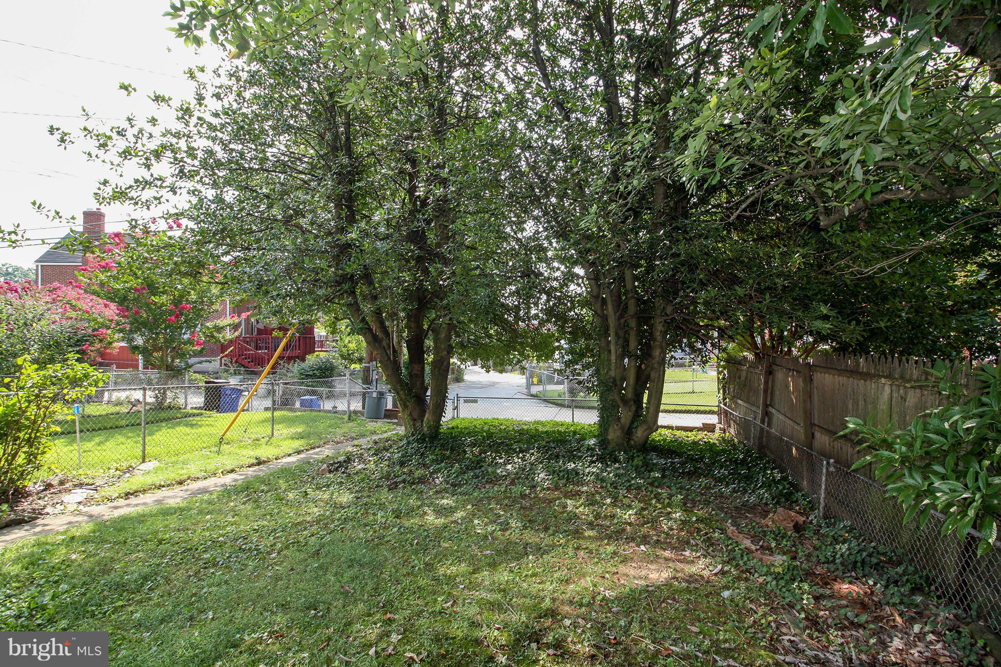 8427 Pleasant Plains Road Baltimore, MD 21286 - Photo 30 of 30 a view of outdoor space with deck and yard