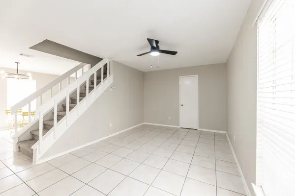 a view of an entryway with wooden floor