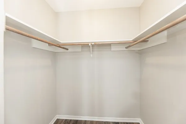 a view of an empty walk in closet