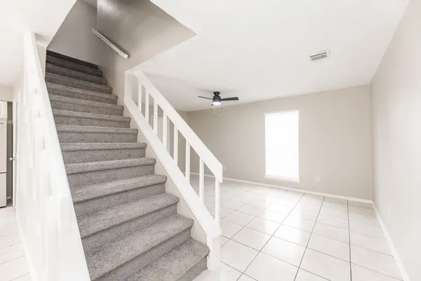 a view of entryway with stairs