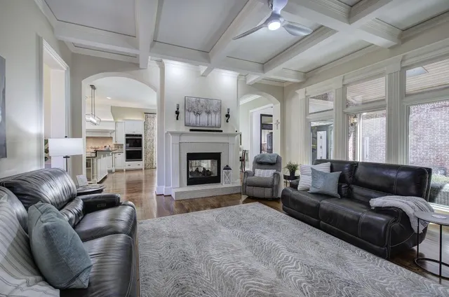 a kitchen with stainless steel appliances granite countertop a stove sink and cabinets