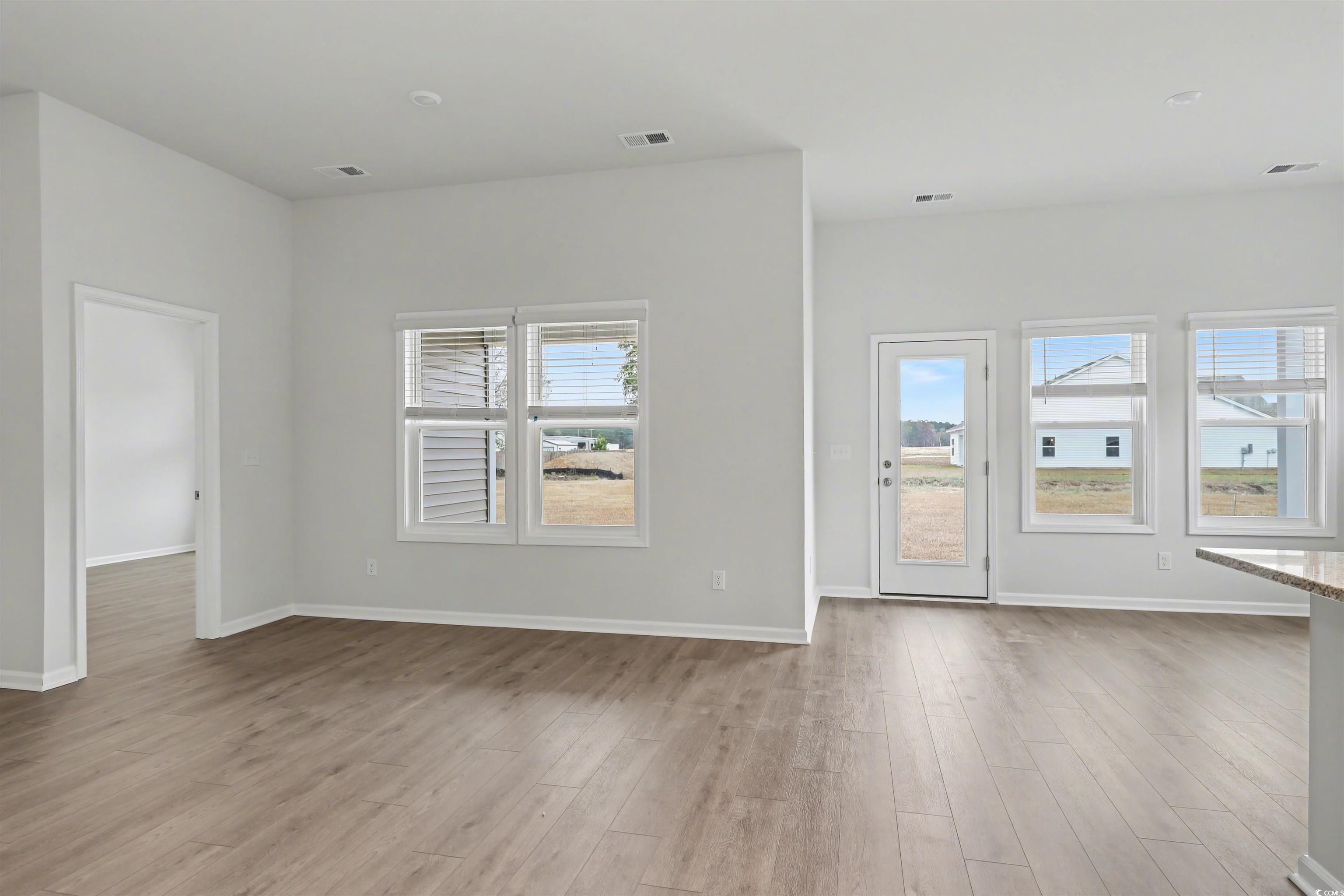 370 Garden Grove Street Conway, SC 29526 - Photo 11 of 28 Spare room with light wood finished floors and baseboards