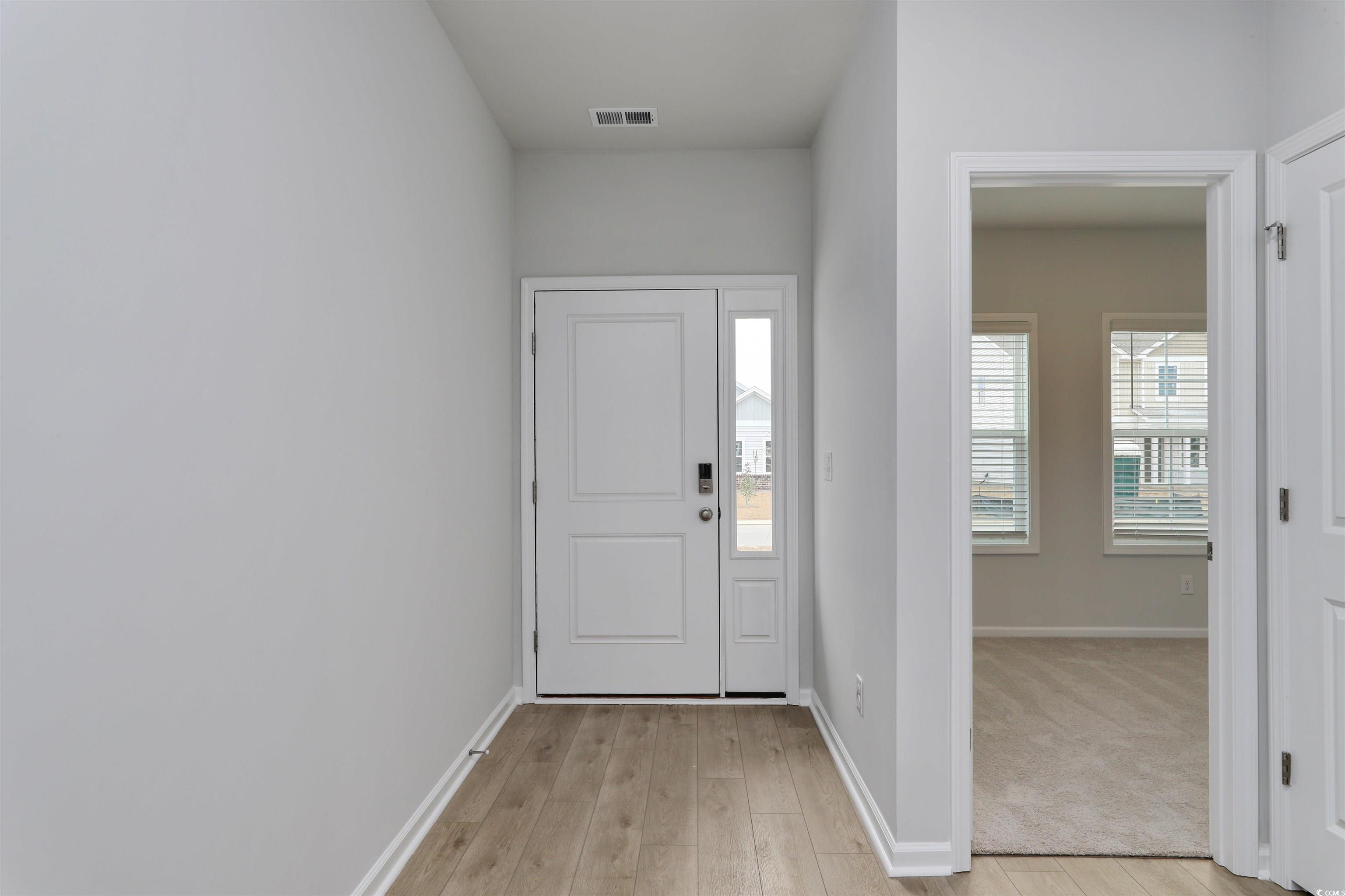 370 Garden Grove Street Conway, SC 29526 - Photo 20 of 28 Foyer with light wood-style floors and baseboards