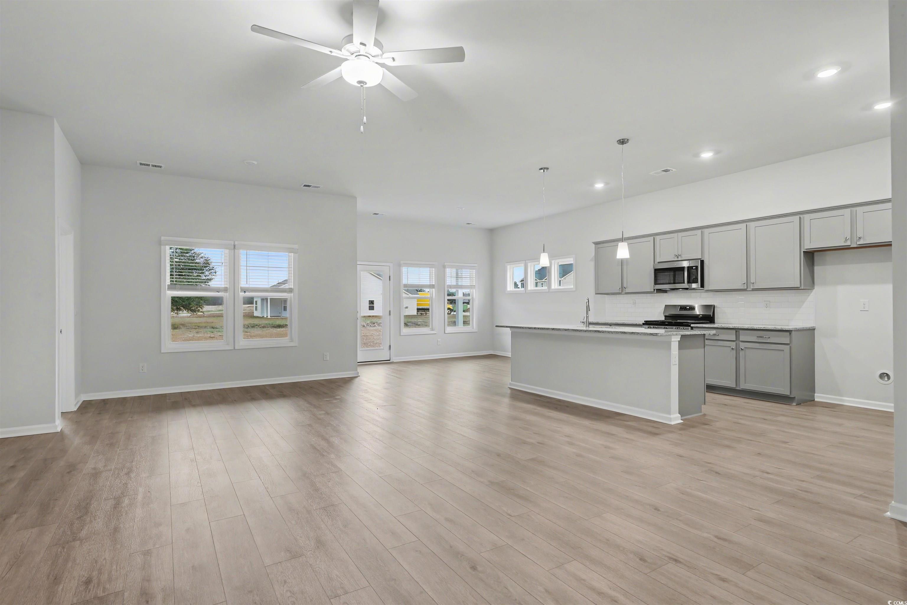 370 Garden Grove Street Conway, SC 29526 - Photo 2 of 28 Living area featuring recessed lighting, ceiling fan, and light wood finished floors
