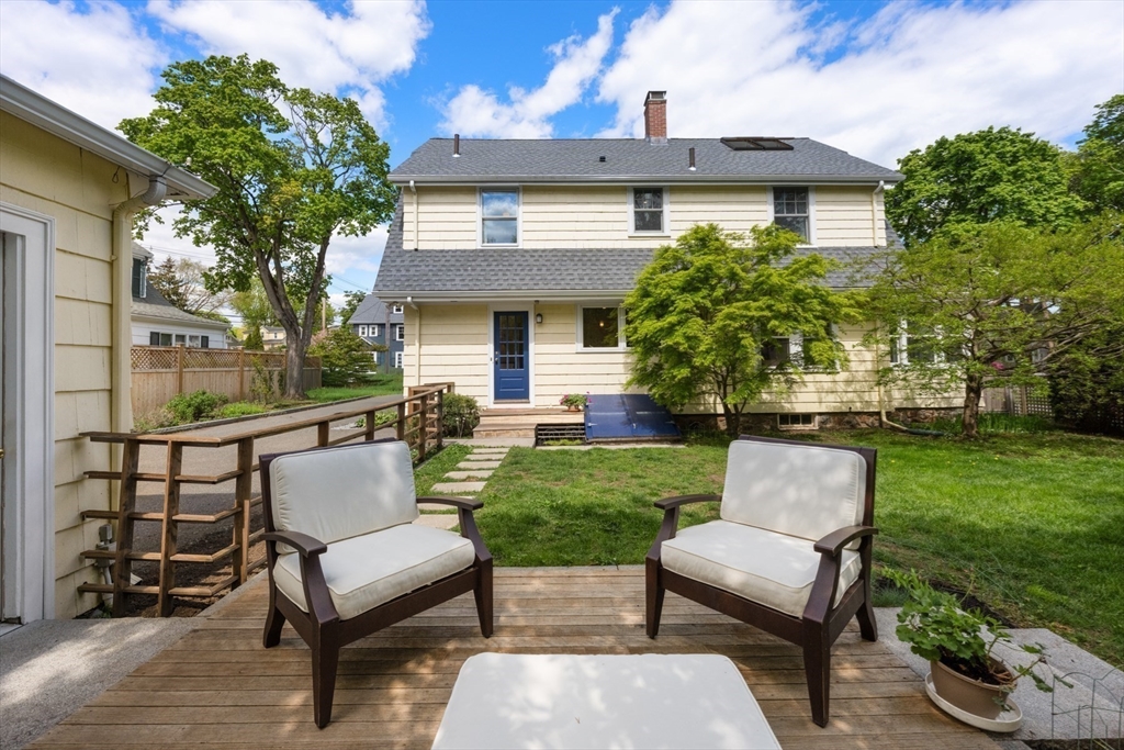 8 Charlotte Road Marblehead, MA 01945 - Photo 30 of 37 a view of a patio with couches chairs and a fire pit