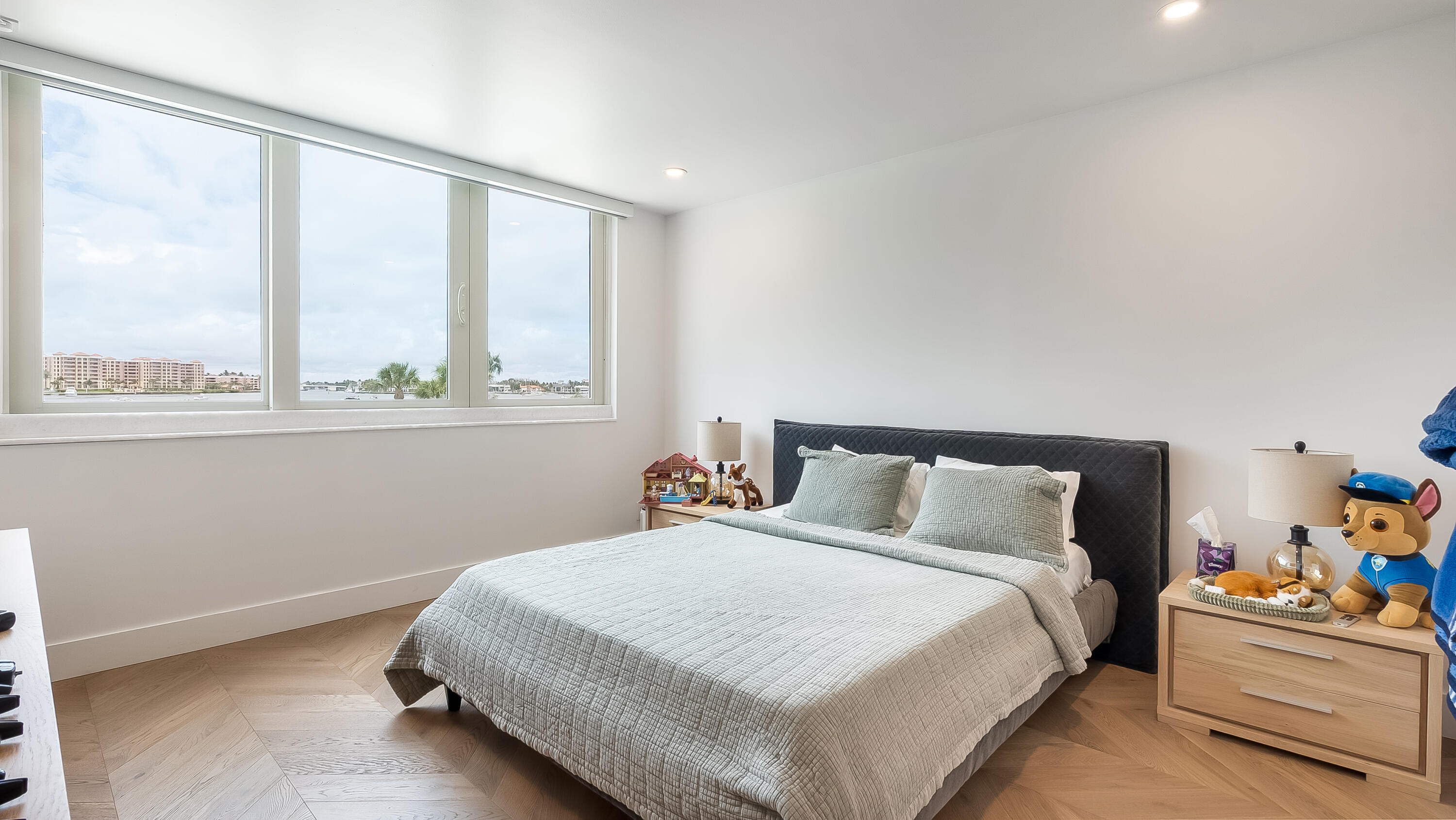 901 East Camino Real, Unit 2A Boca Raton, FL 33432 - Photo 17 of 30 a bedroom with a bed and a window