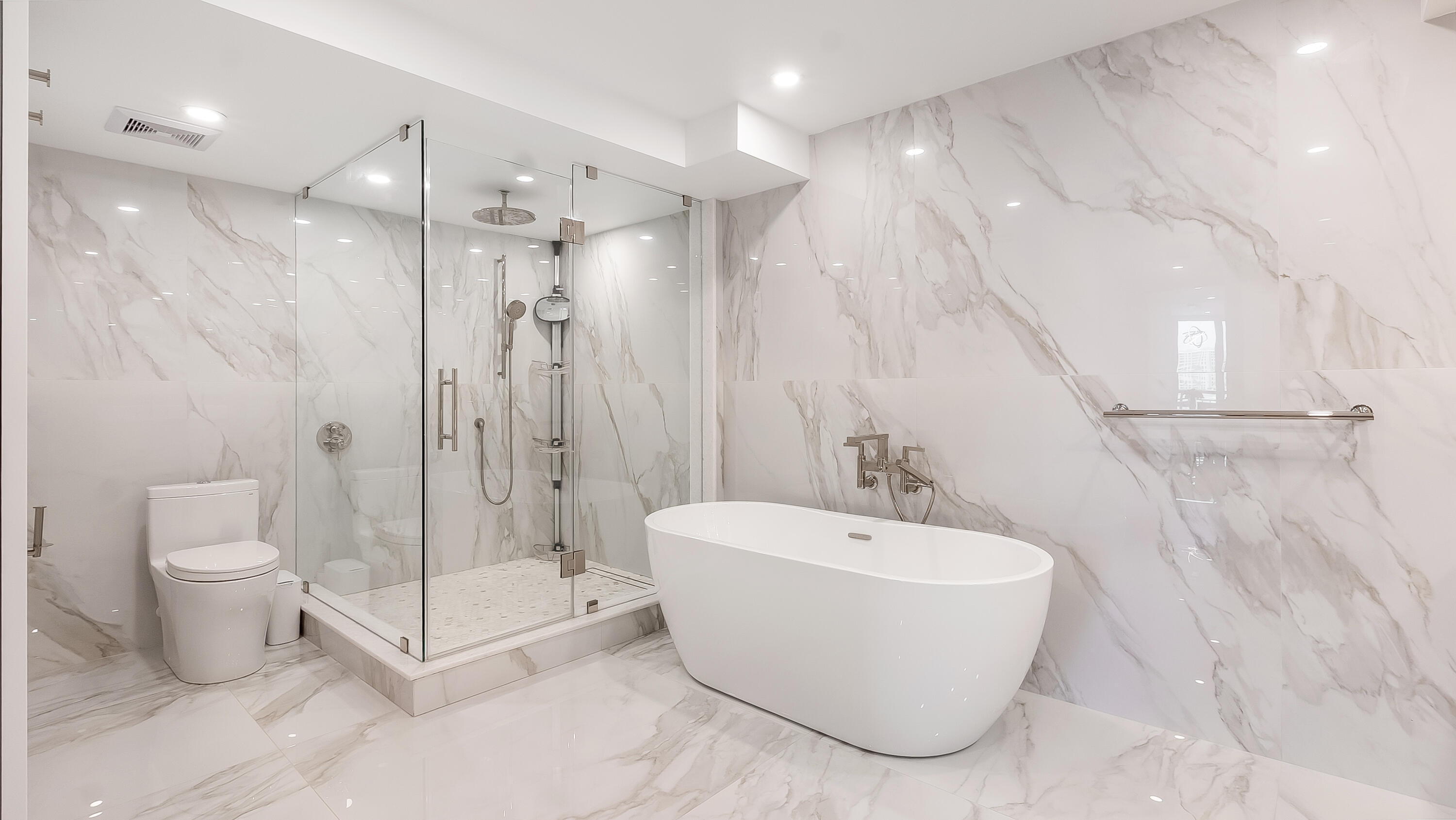 901 East Camino Real, Unit 2A Boca Raton, FL 33432 - Photo 25 of 30 a bathroom with a bathtub and shower