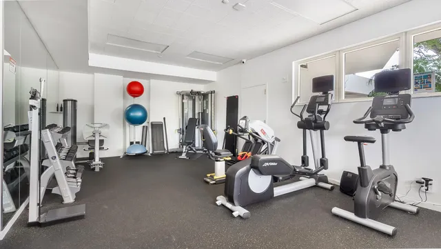 a view of a room with gym equipment