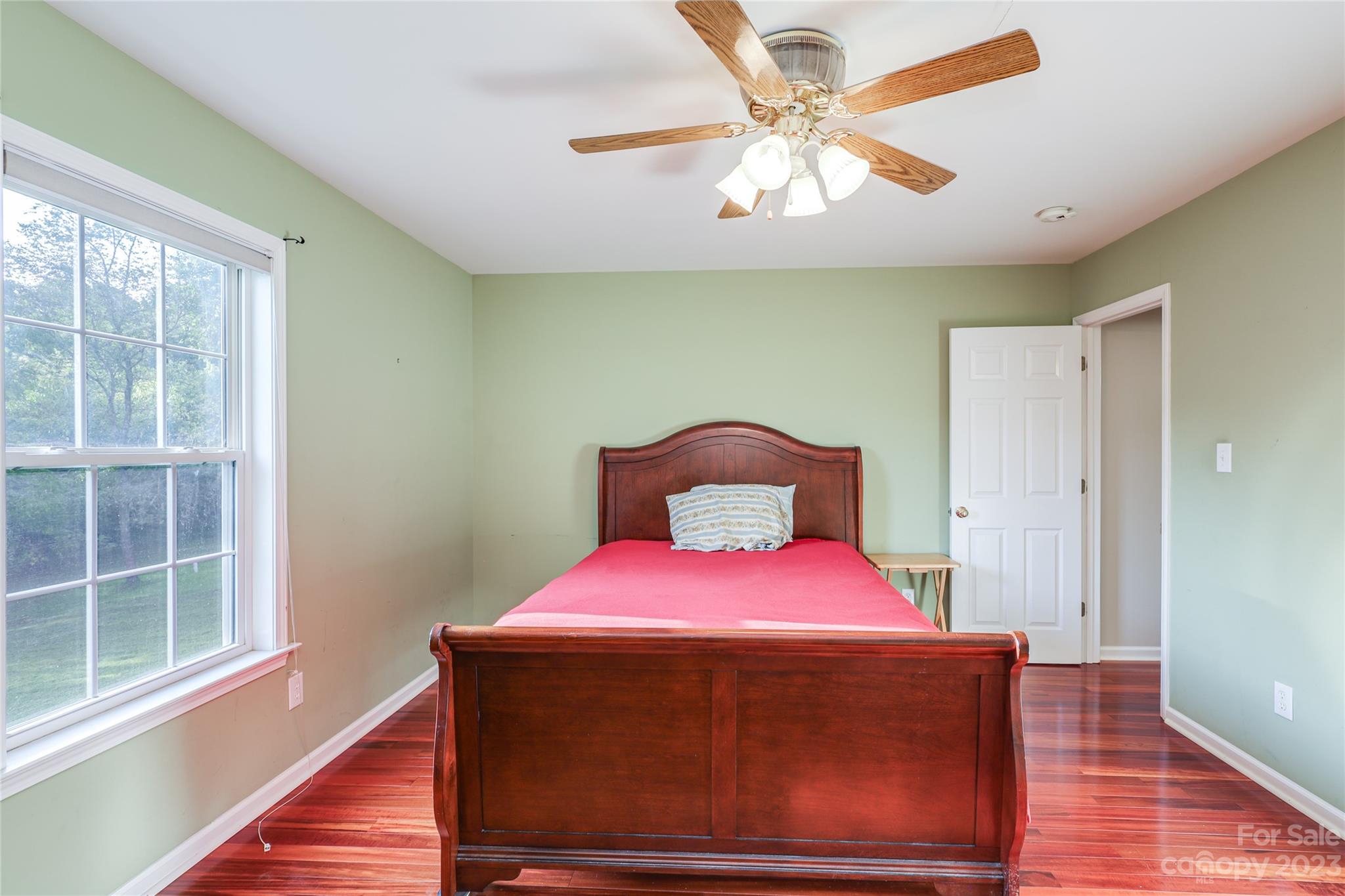 111 Hoyle Street Morganton, NC 28655 - Photo 15 of 30 a bedroom with a bed and a window