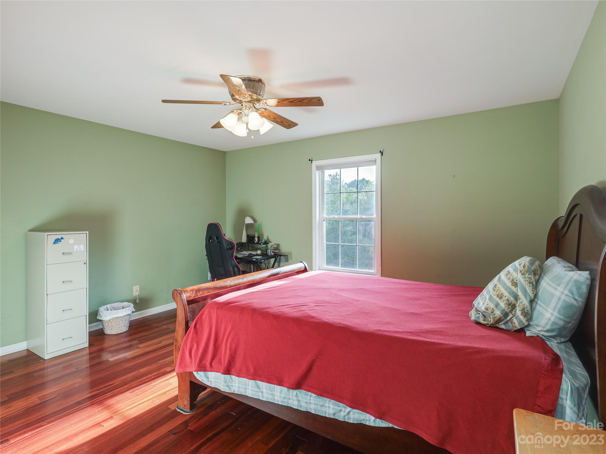 111 Hoyle Street Morganton, NC 28655 - Photo 17 of 30 a bedroom with a bed and a window