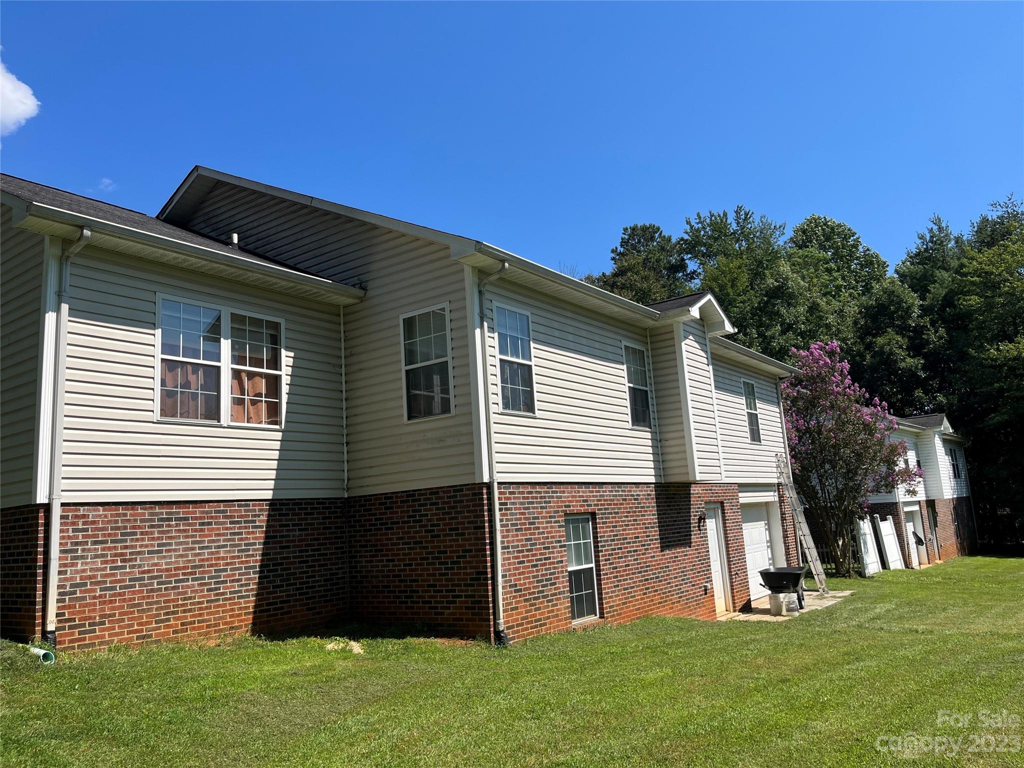 111 Hoyle Street Morganton, NC 28655 - Photo 2 of 30 a front view of a house with a garden
