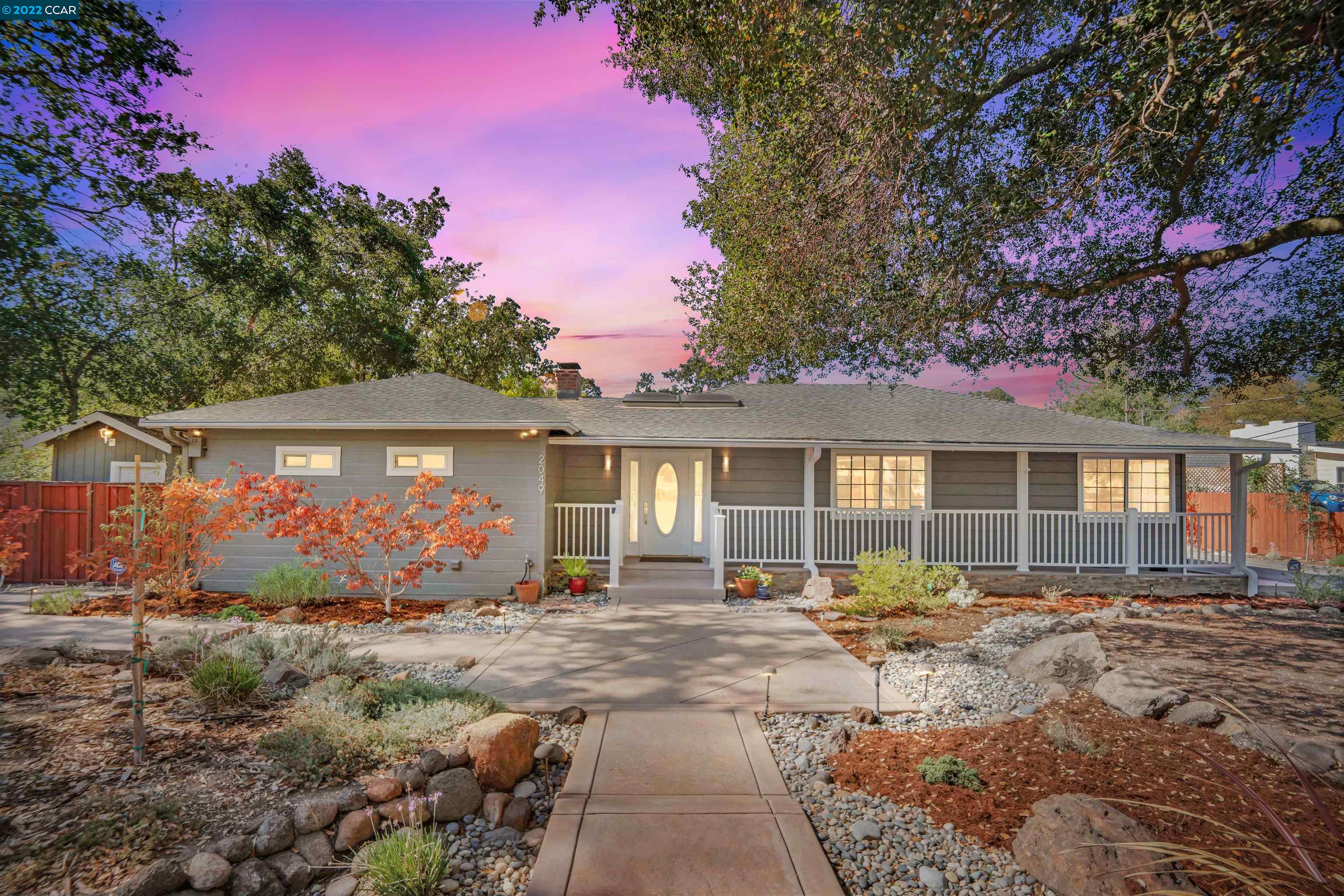 front view of a house with a patio