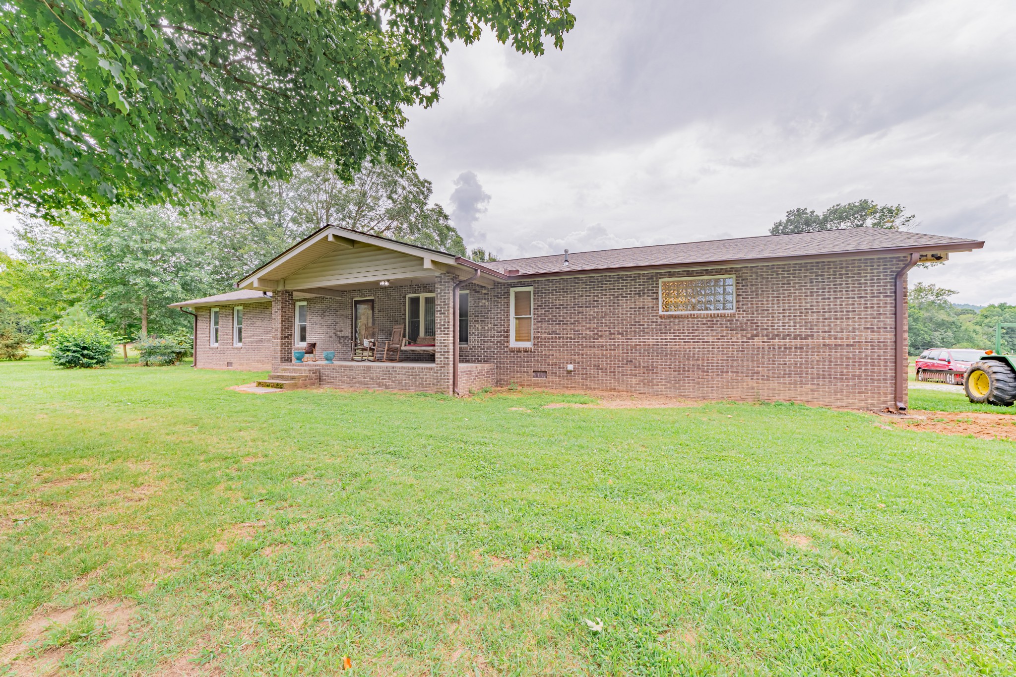 292 Laynes Cove Road Pelham, TN 37366 - Photo 1 of 43 a front view of a house with yard and green space