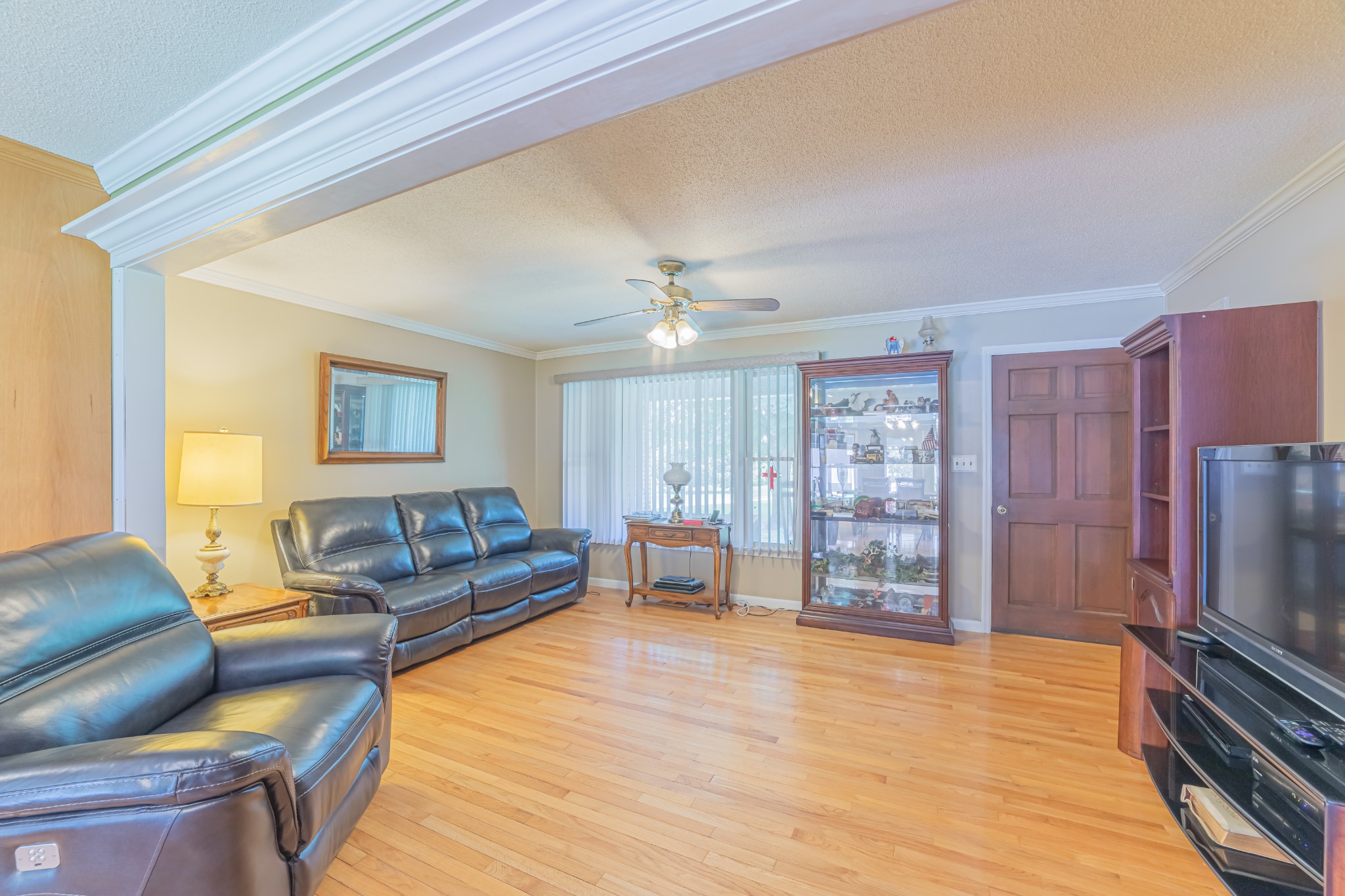 292 Laynes Cove Road Pelham, TN 37366 - Photo 14 of 43 a living room with furniture and a flat screen tv