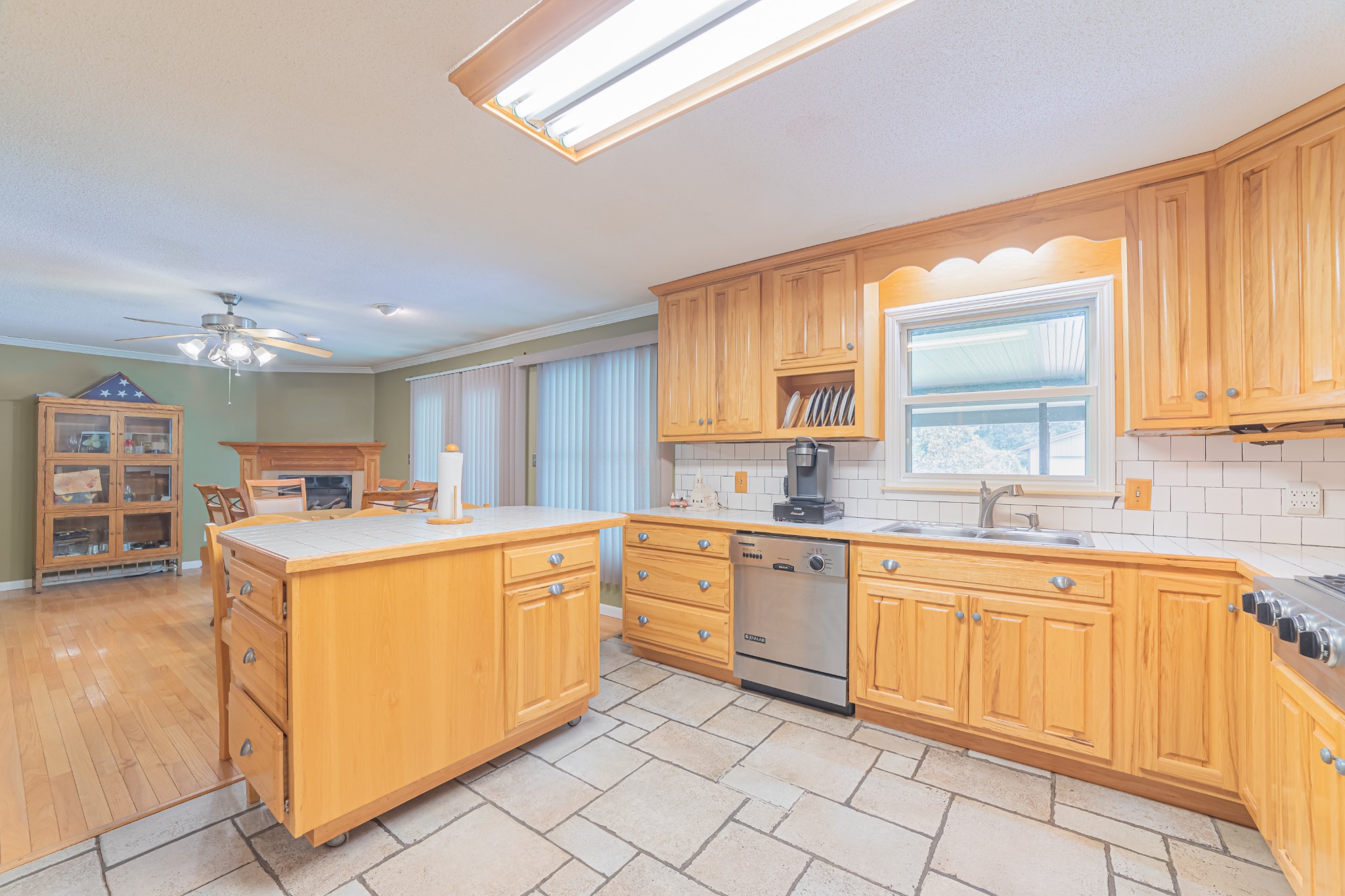 292 Laynes Cove Road Pelham, TN 37366 - Photo 17 of 43 a kitchen with cabinets appliances and a window