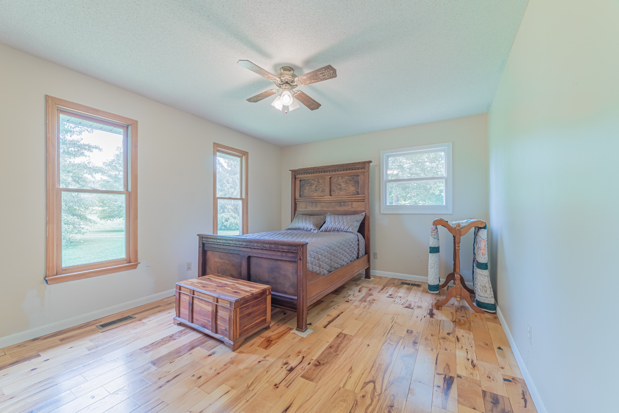 292 Laynes Cove Road Pelham, TN 37366 - Photo 23 of 43 a bedroom with a bed wooden floor and window