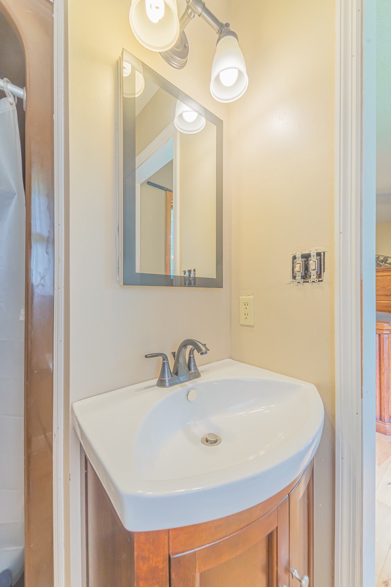 292 Laynes Cove Road Pelham, TN 37366 - Photo 33 of 43 a bathroom with a sink and a mirror