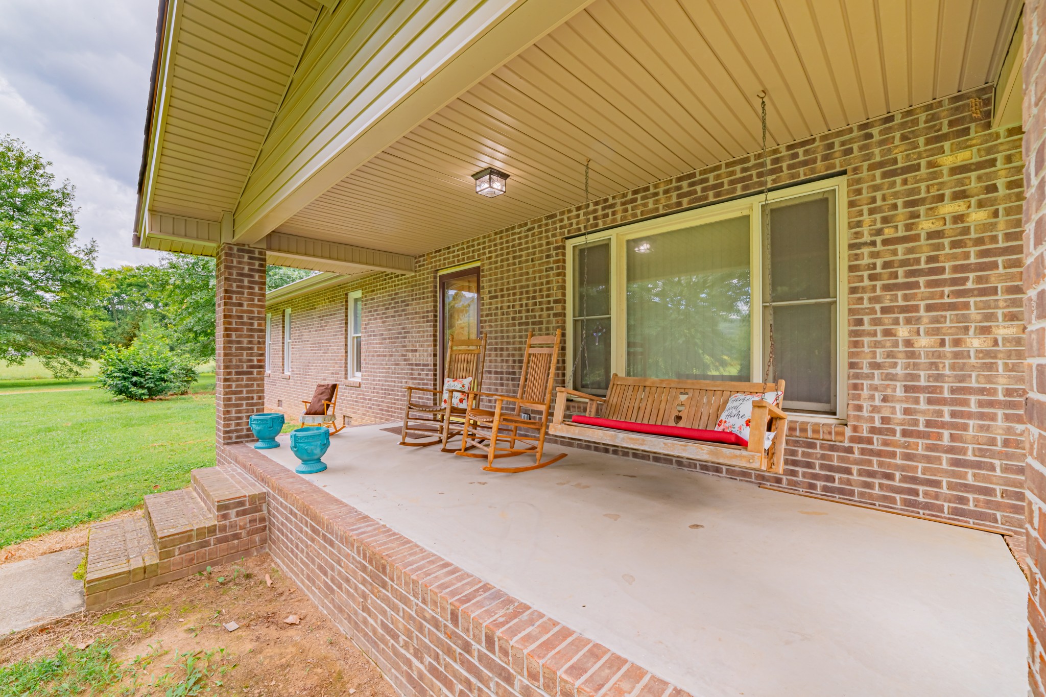 292 Laynes Cove Road Pelham, TN 37366 - Photo 4 of 43 a view of swimming pool with lounge chair in front of house