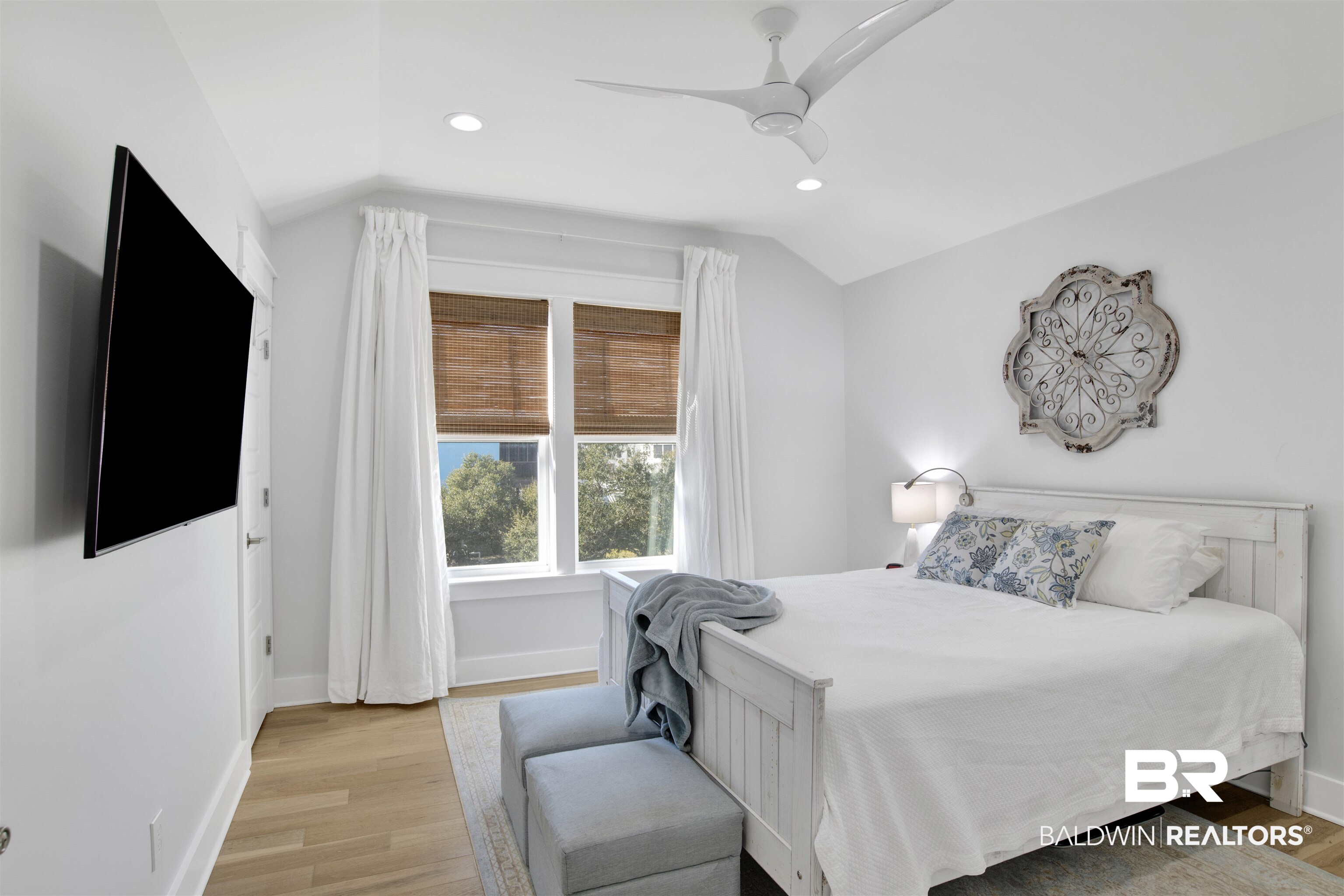 32937 River Road Orange Beach, AL 36561 - Photo 27 of 42 Bedroom with ceiling fan, light hardwood / wood-style floors, and lofted ceiling
