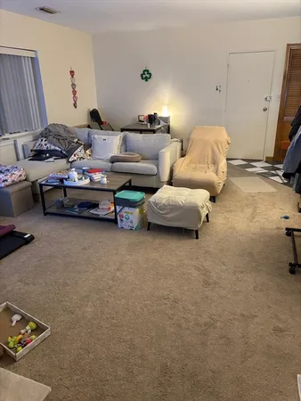 a bedroom with furniture and a couch