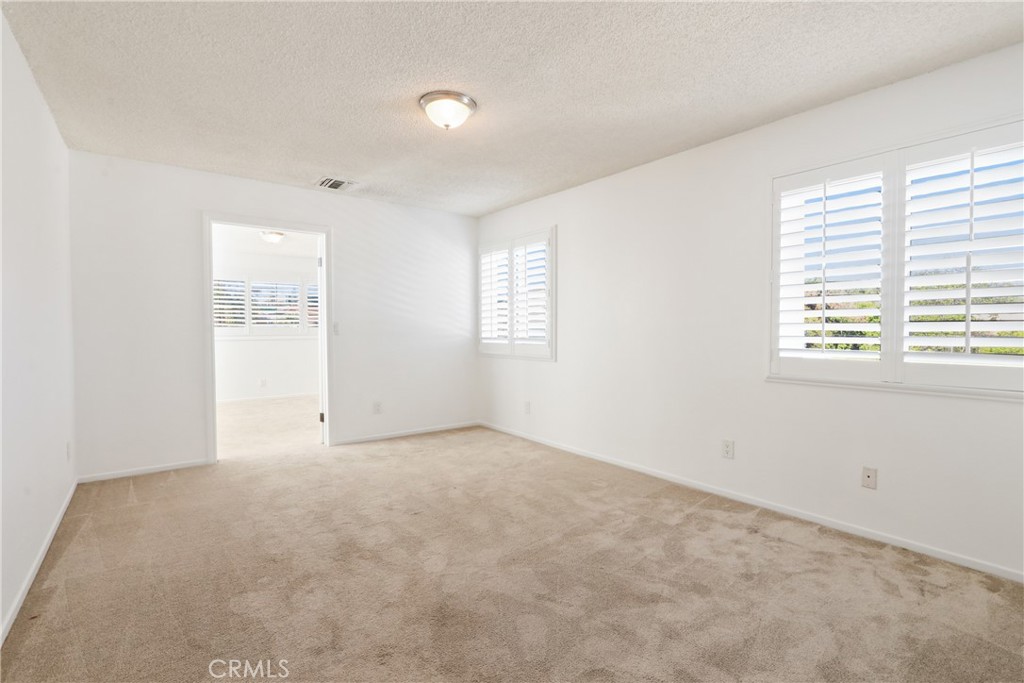 657 Wilber Place Montebello, CA 90640 - Photo 11 of 32 an empty room with windows