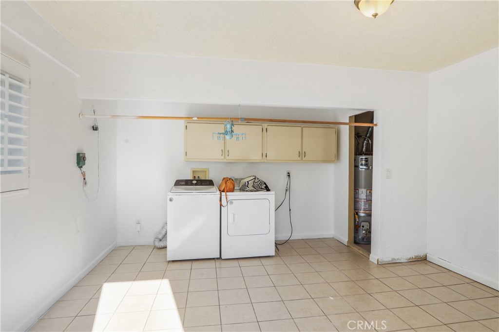657 Wilber Place Montebello, CA 90640 - Photo 15 of 32 a view of utility room with washer and dryer
