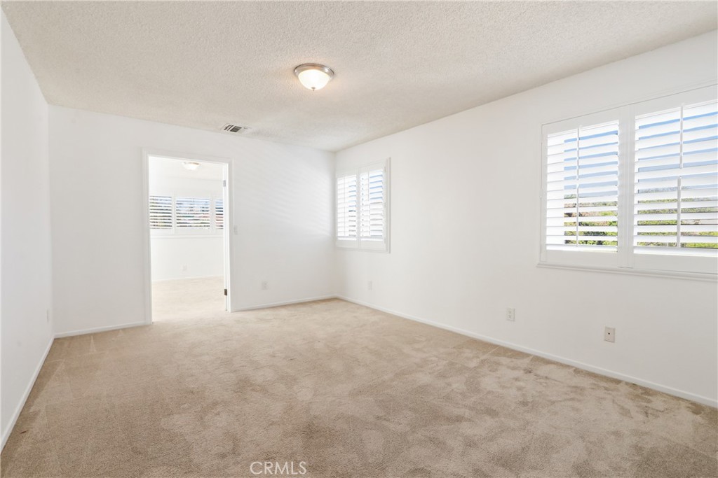 657 Wilber Place Montebello, CA 90640 - Photo 27 of 32 an empty room with windows