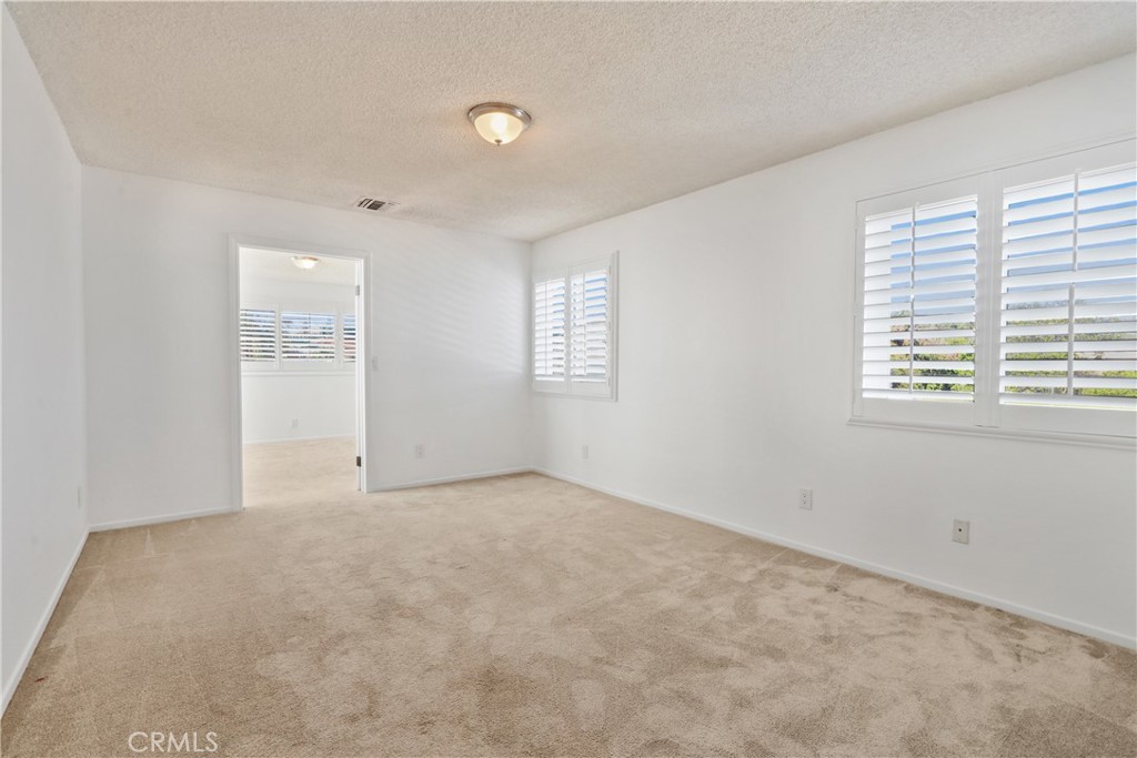 657 Wilber Place Montebello, CA 90640 - Photo 28 of 32 an empty room with windows