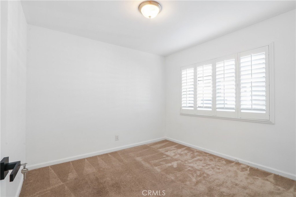 657 Wilber Place Montebello, CA 90640 - Photo 5 of 32 an empty room with windows