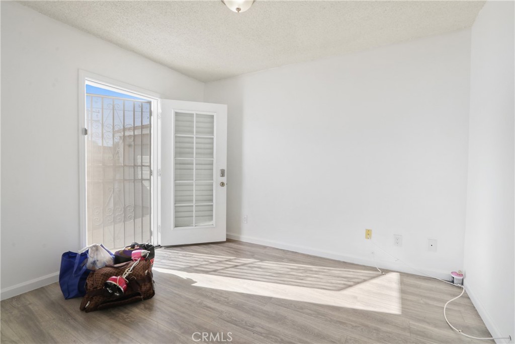 657 Wilber Place Montebello, CA 90640 - Photo 9 of 32 a view of a room with wooden floor and a window