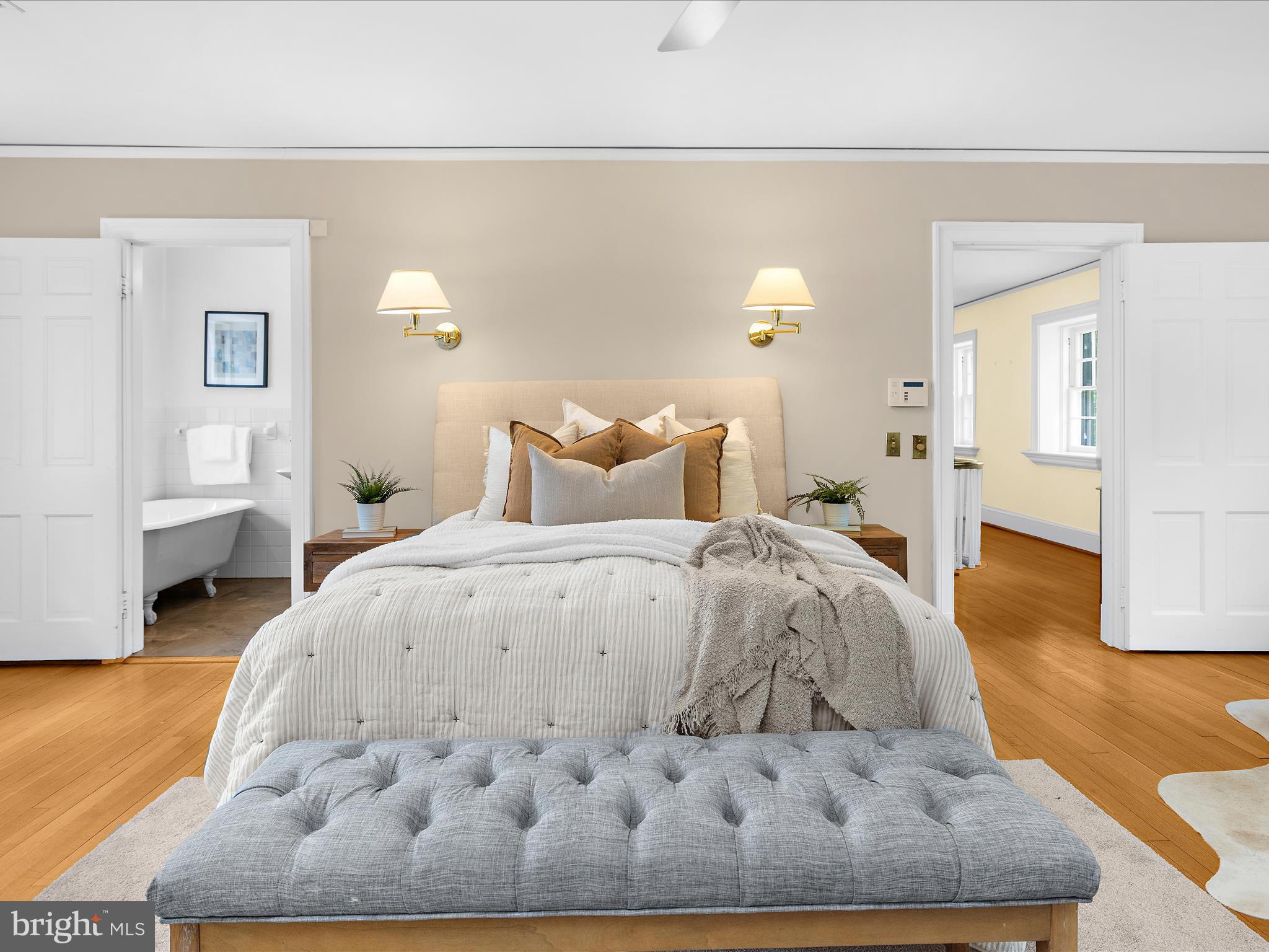 117 Taplow Road Baltimore, MD 21212 - Photo 25 of 57 a bedroom with a bed and wooden floor
