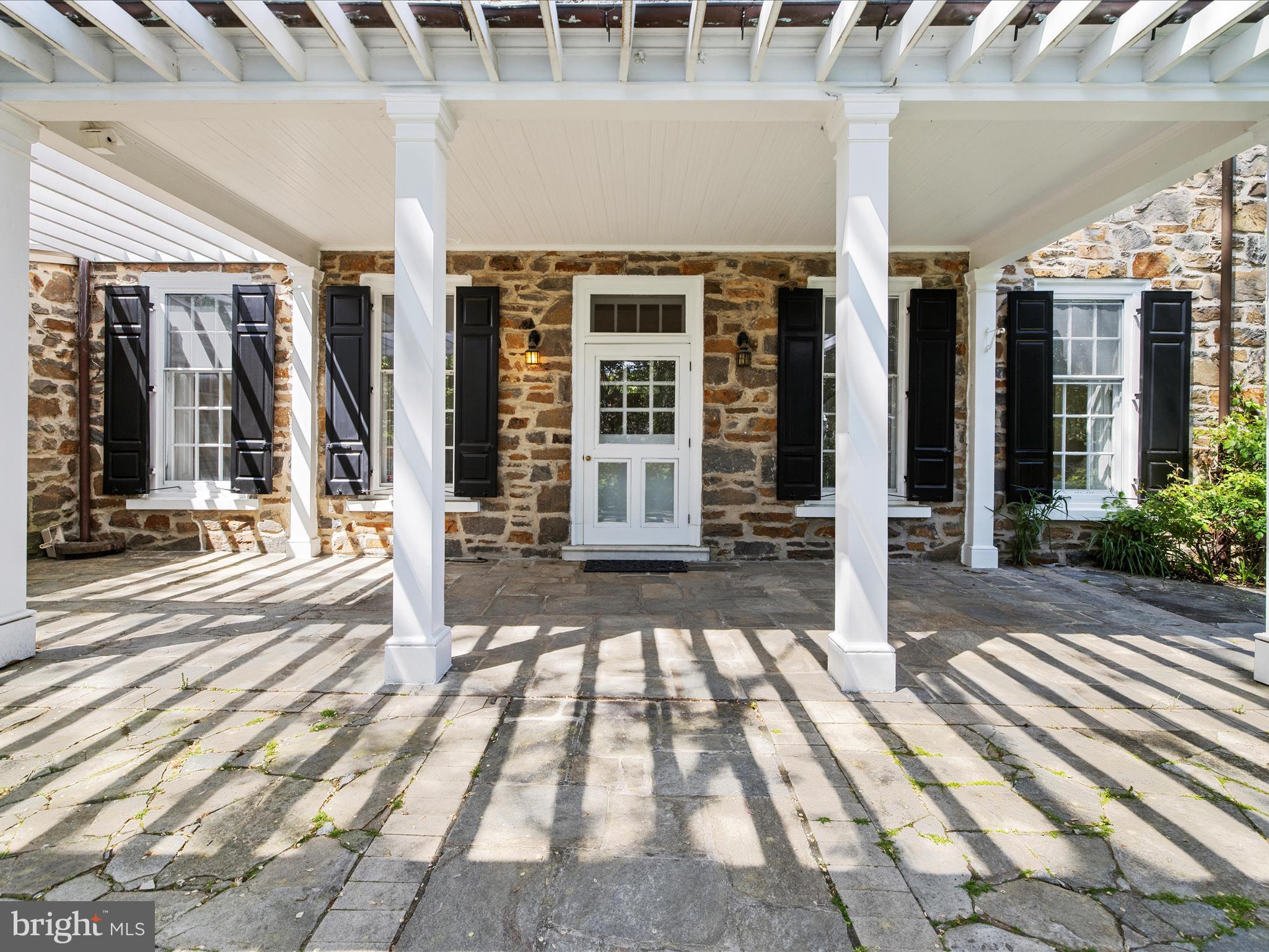 117 Taplow Road Baltimore, MD 21212 - Photo 47 of 57 a front view of a house with a large window