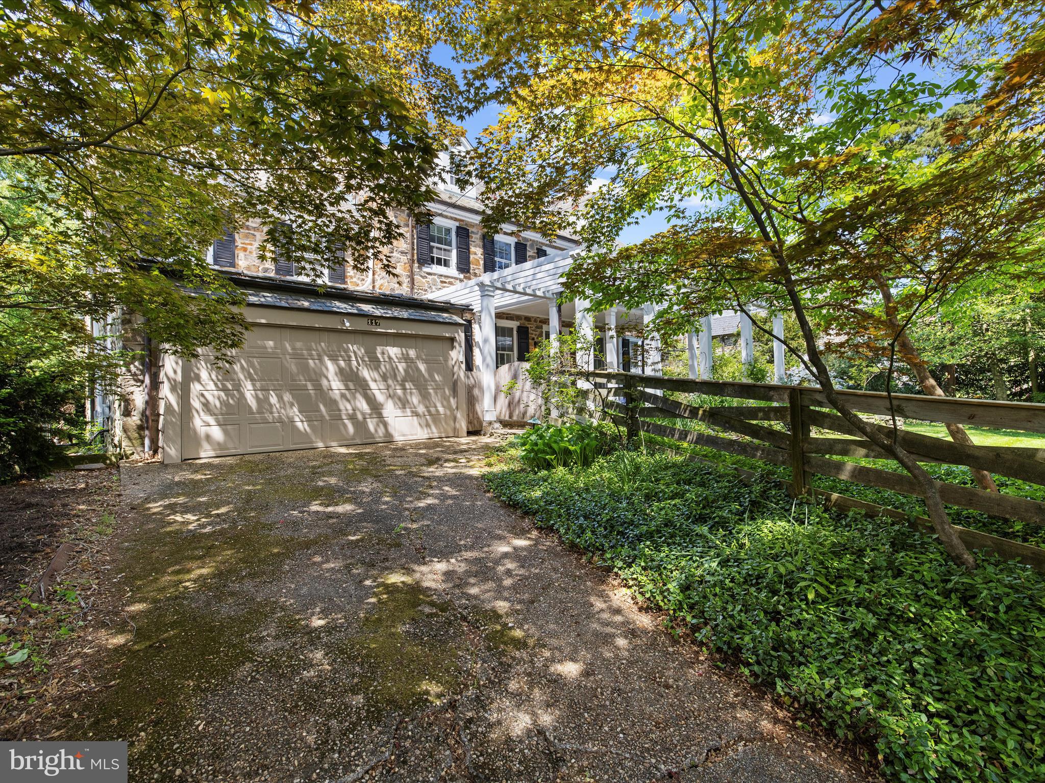117 Taplow Road Baltimore, MD 21212 - Photo 51 of 57 a front view of a house with a yard