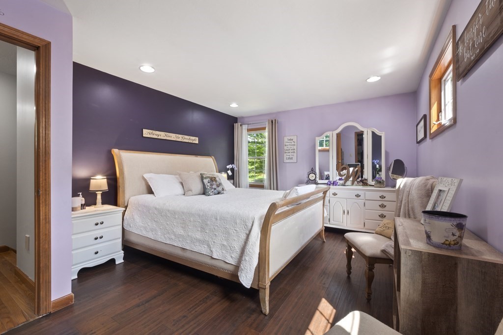 4 Huntington Road Blandford, MA 01008 - Photo 17 of 27 a bed room with a bed and a chair